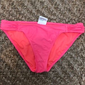 Coral/pink bikini bottoms
